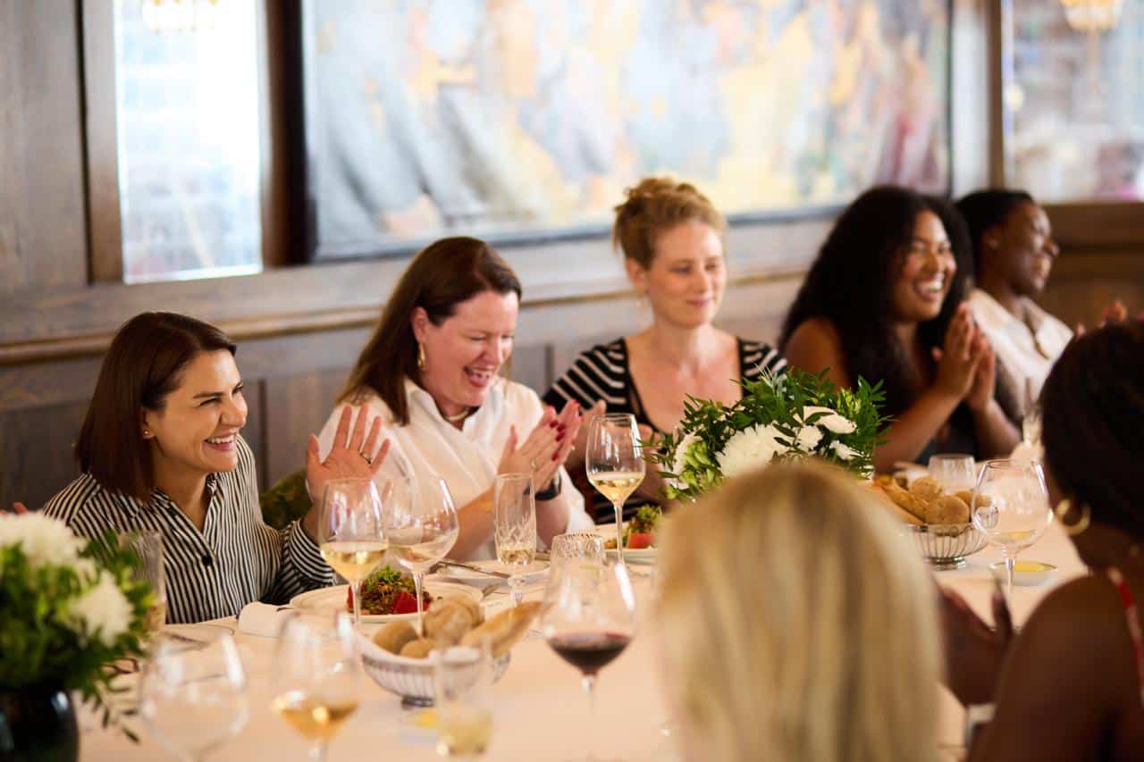 Women Who Lead lunch guests in conversation